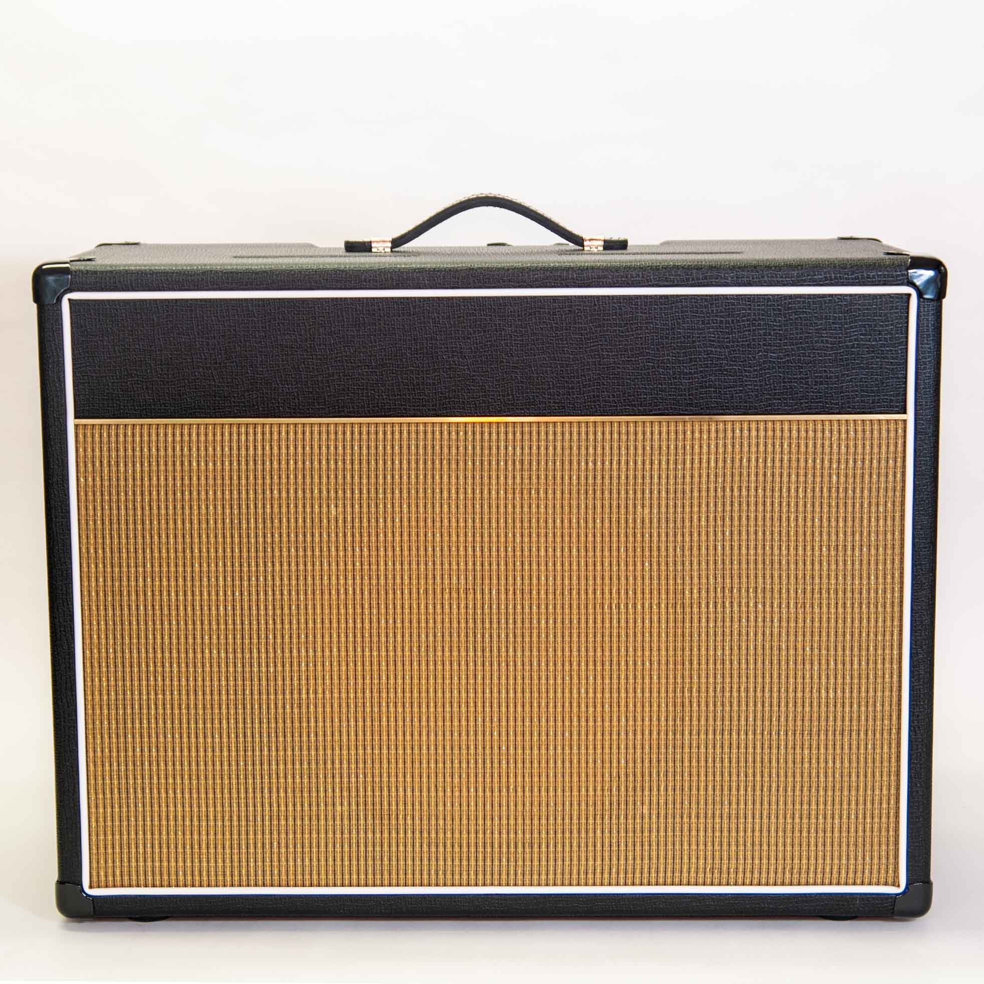 Guitar amp front view, black textured vinyl cover with gold striped grill cloth